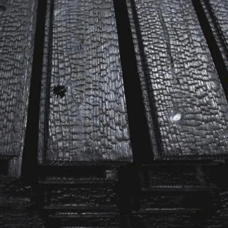 Lames bardage bois brulé rainures languettes 